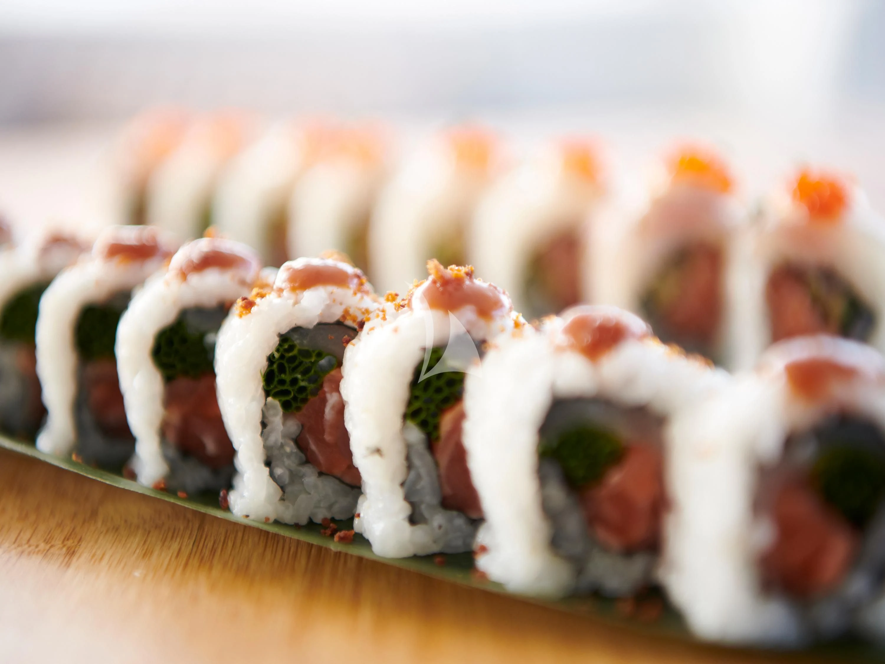 a plate of sushi aboard KIMATA Yacht for Charter