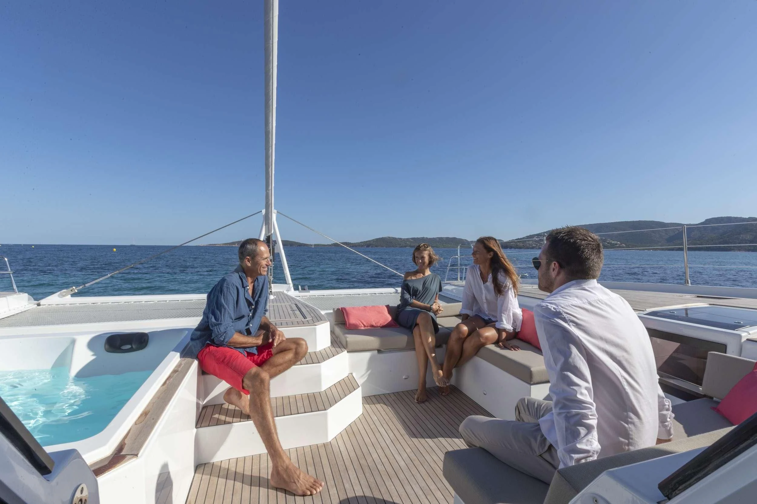 a group of people on a boat aboard KIMATA Yacht for Charter