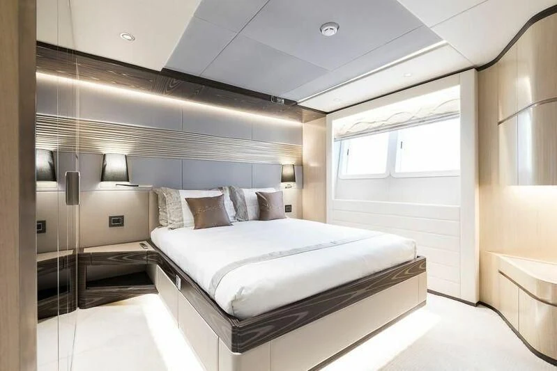 a bed in a room aboard KRISHH Yacht for Sale