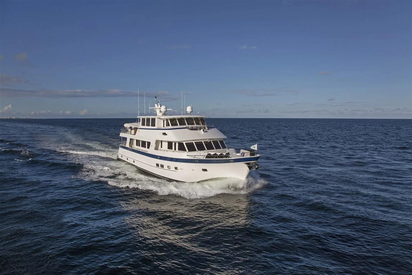 a white boat on the water aboard 860 DBMY Yacht for Sale