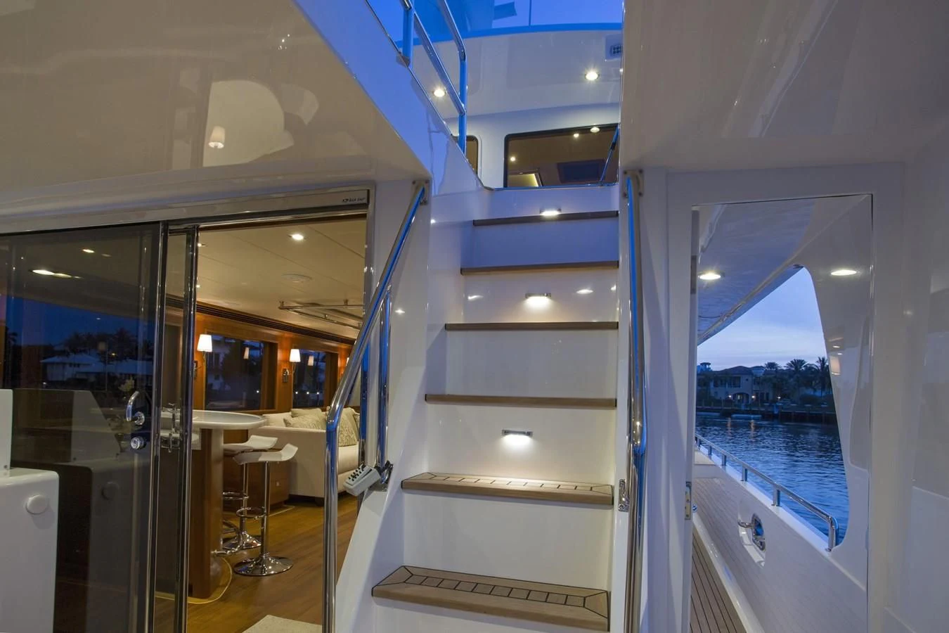 a room with a glass door and a view of the water aboard 860 DBMY Yacht for Sale