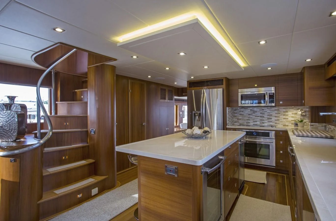 a kitchen with a large island aboard 860 DBMY Yacht for Sale