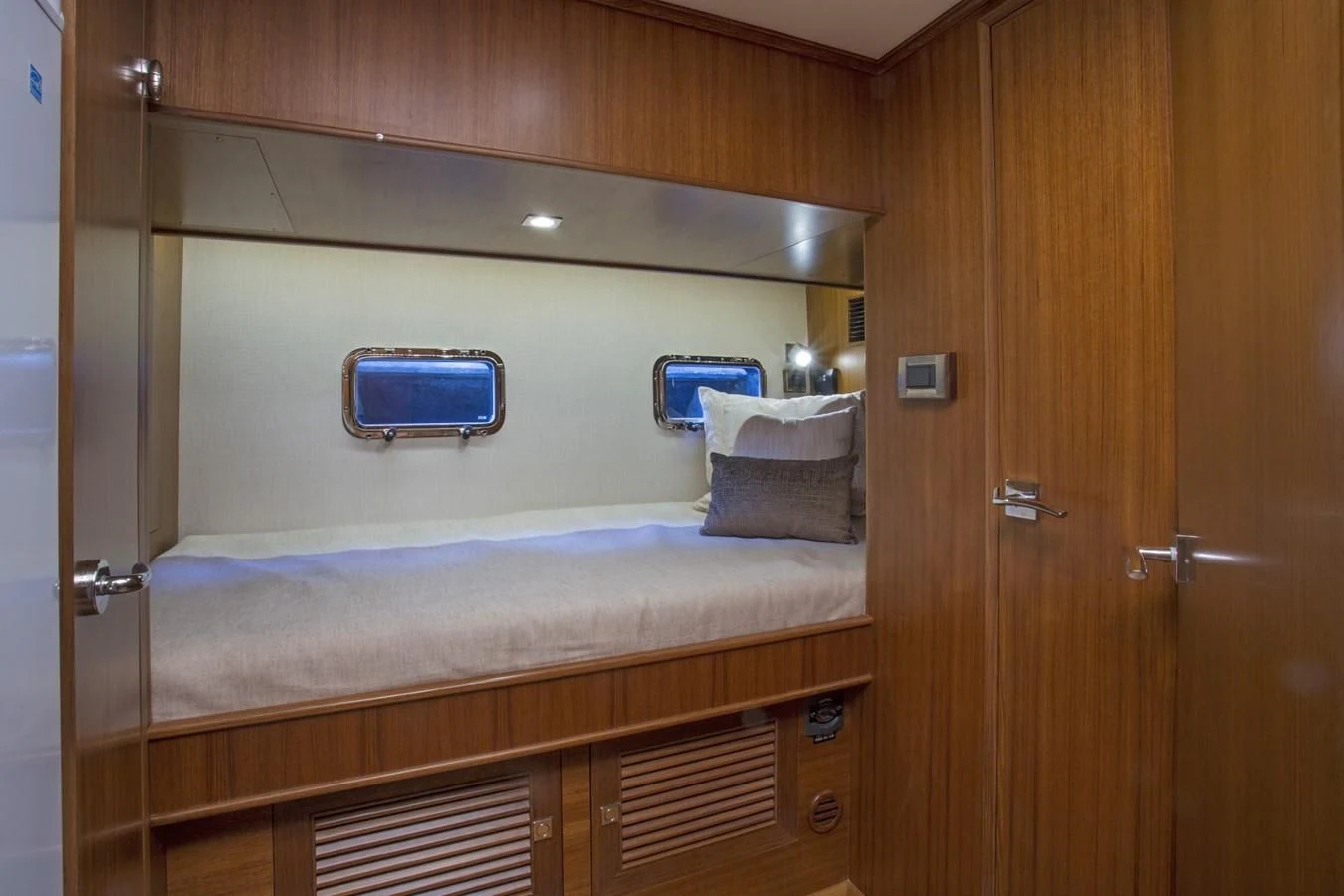 a room with a bed and a closet aboard 860 DBMY Yacht for Sale