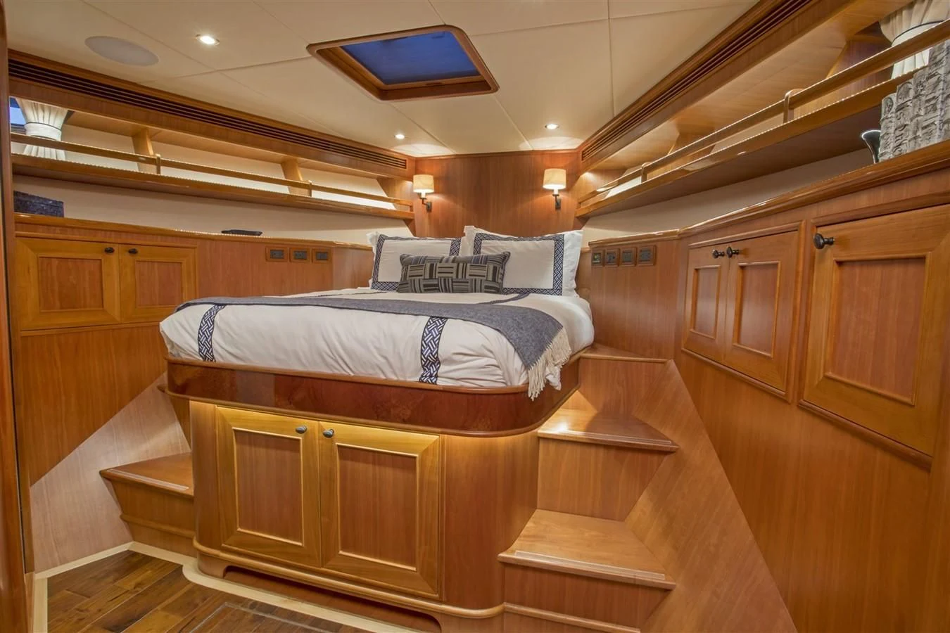 a room with wooden bunk beds aboard 860 DBMY Yacht for Sale