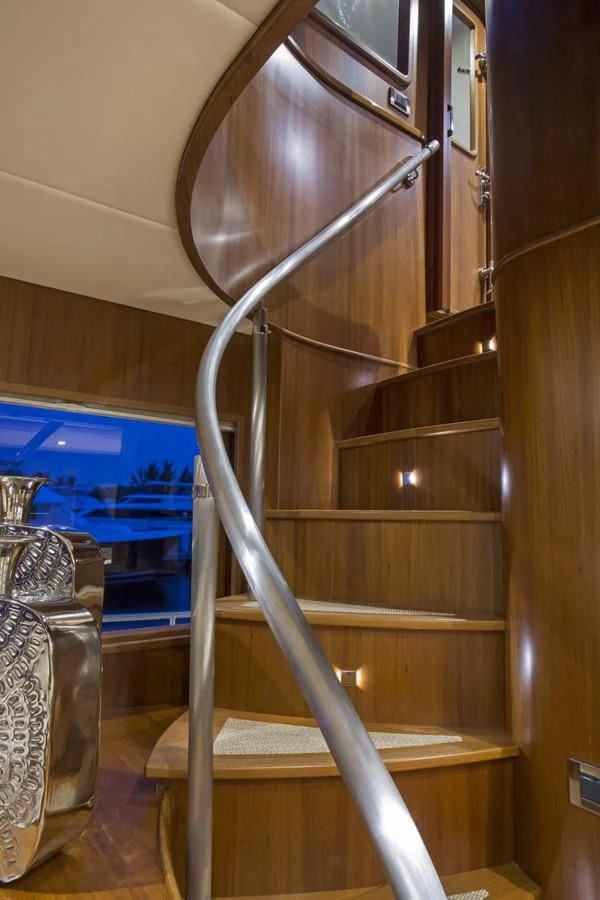 a metal spiral staircase in a house aboard 860 DBMY Yacht for Sale