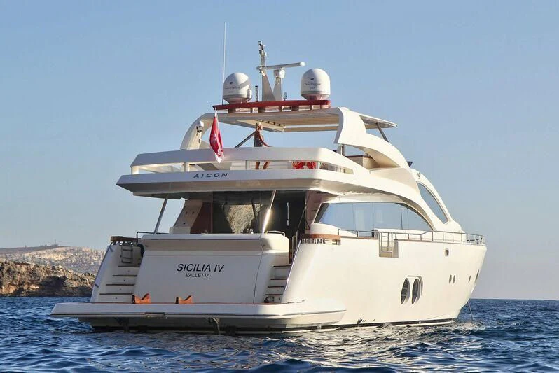 a white boat in the water aboard SICILIA IV Yacht for Sale