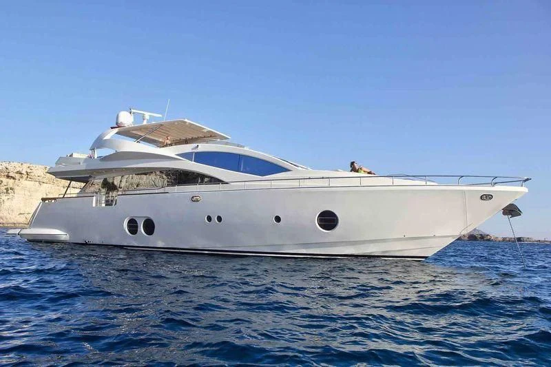 a white yacht in the water aboard SICILIA IV Yacht for Sale