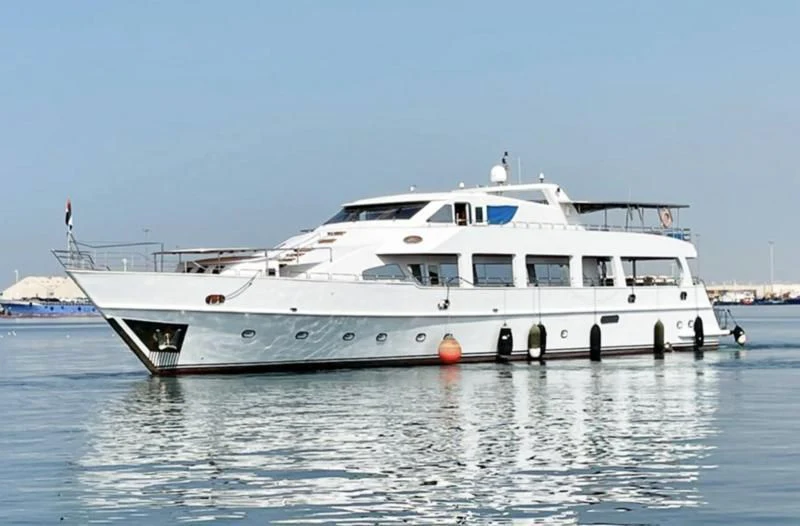 a white boat in the water aboard NASAYEM Yacht for Sale