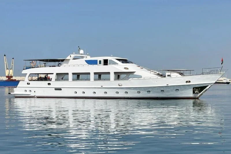 a white yacht in the water aboard NASAYEM Yacht for Sale