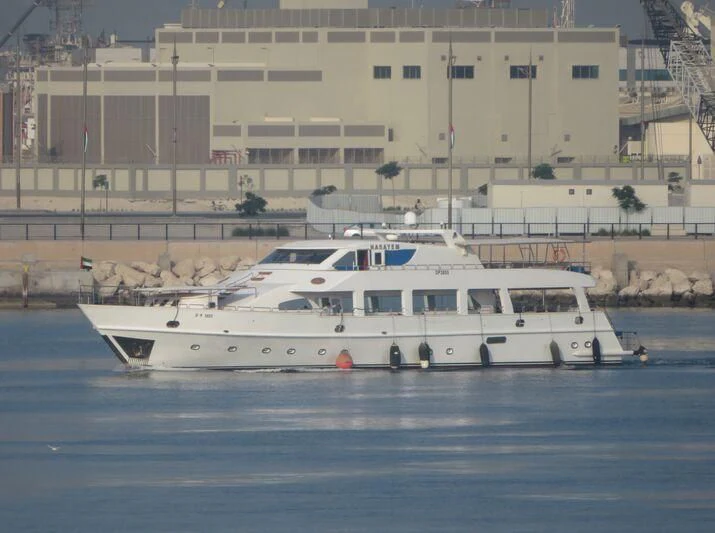 a white boat in the water aboard NASAYEM Yacht for Sale