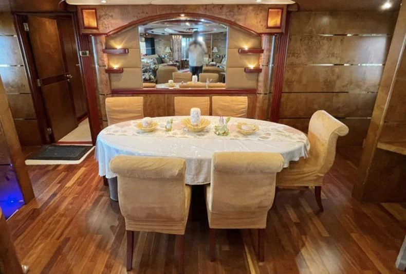 a table with food on it aboard NASAYEM Yacht for Sale