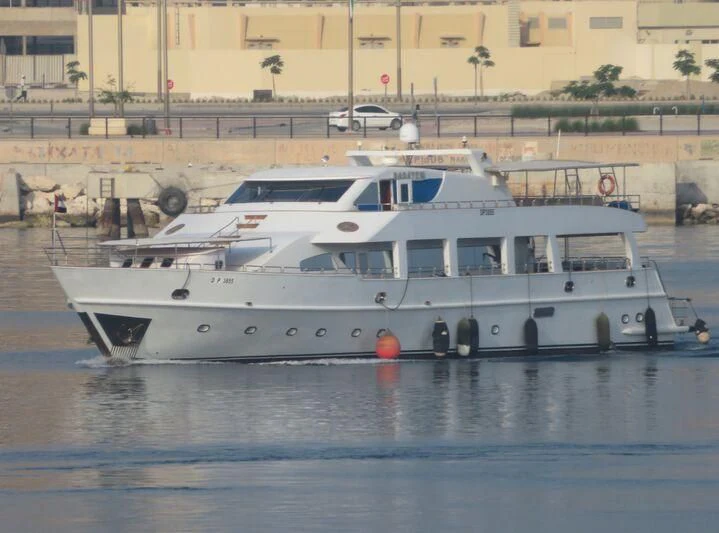 a white boat on the water aboard NASAYEM Yacht for Sale