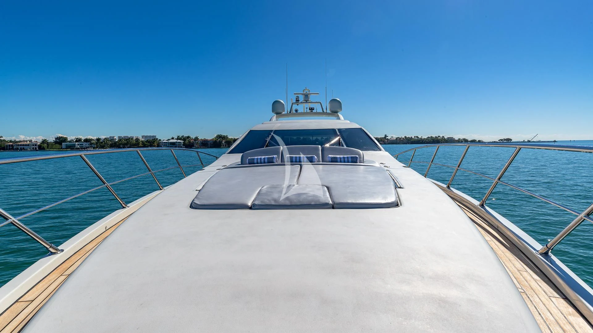 a boat on a body of water aboard M Yacht for Charter