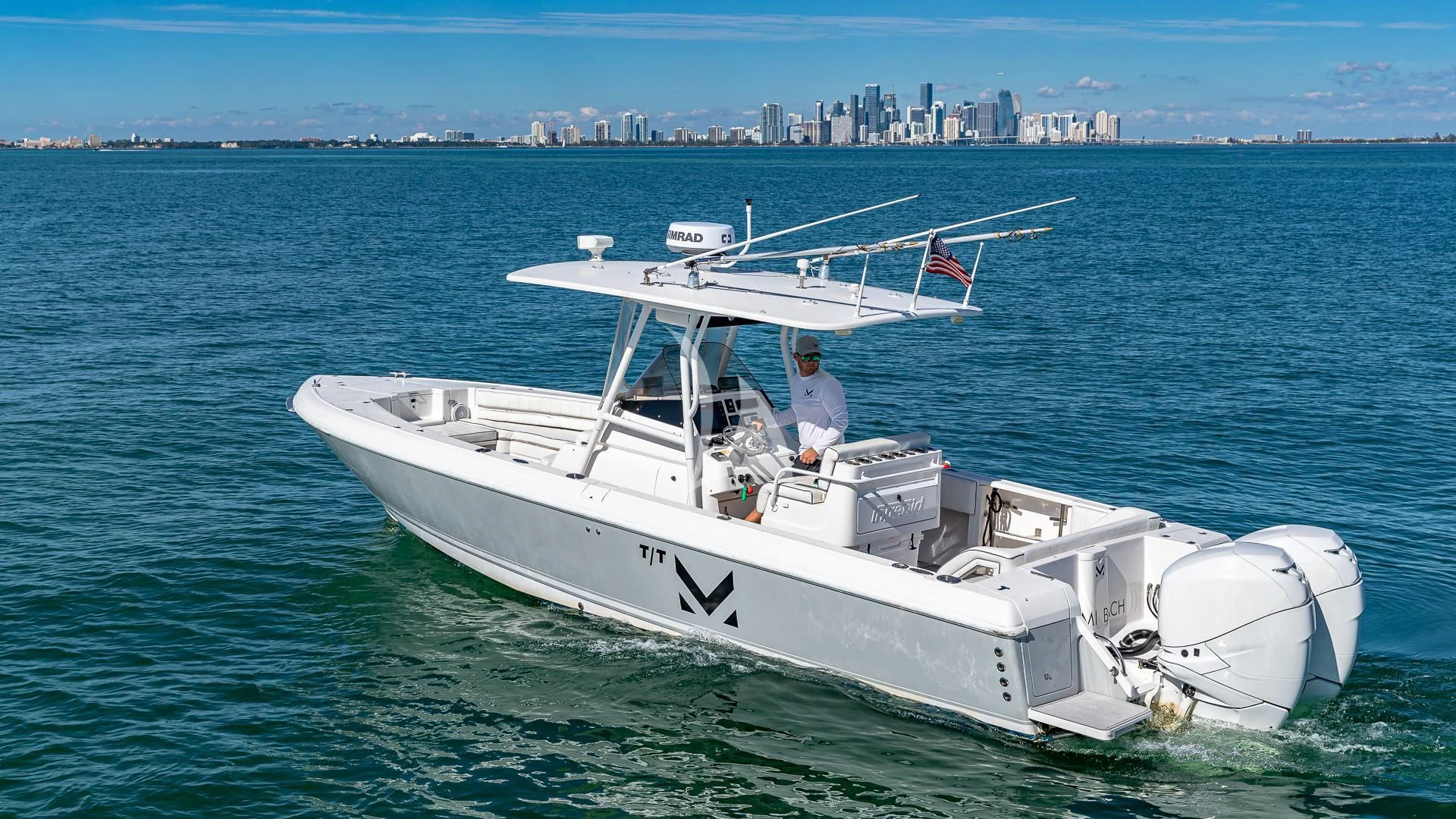 a person on a boat in the water aboard M Yacht for Charter