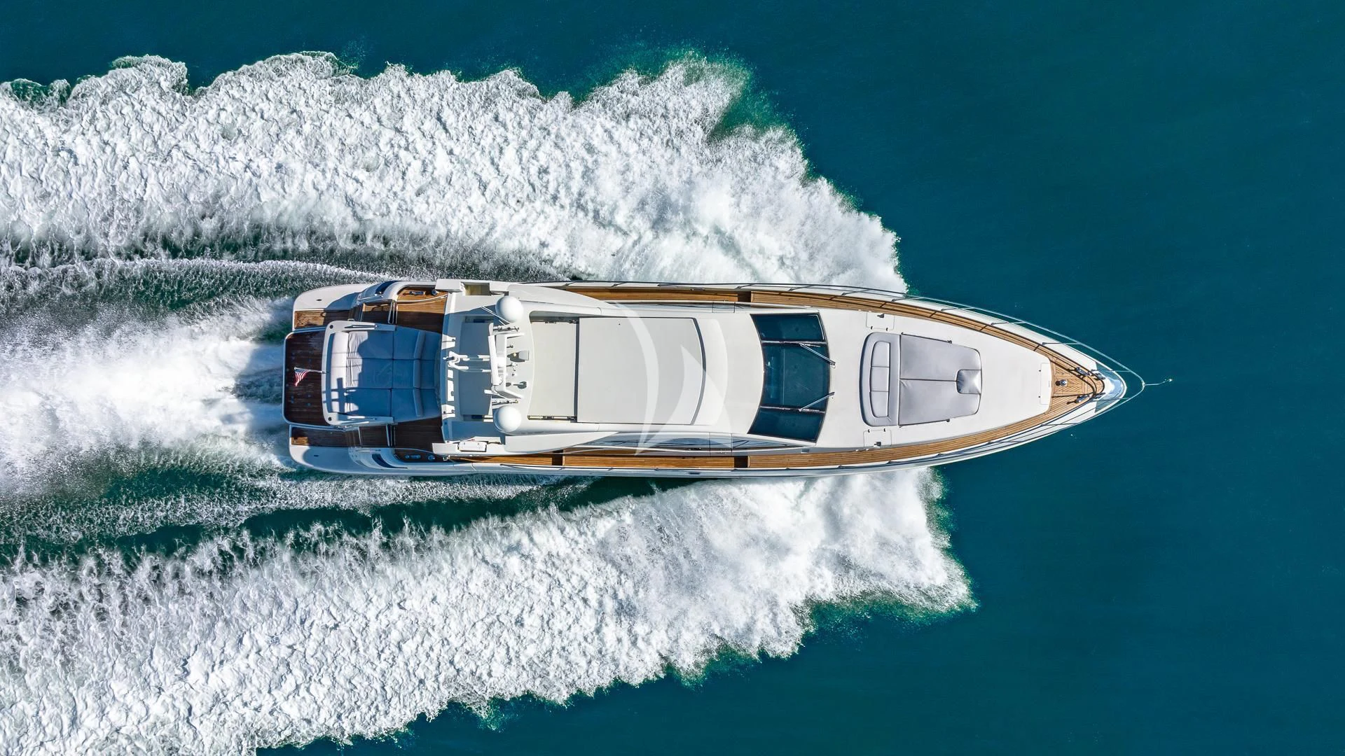a helicopter in the air aboard M Yacht for Charter