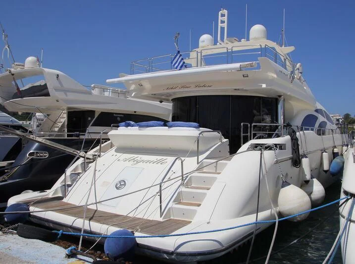 a boat docked at a pier aboard ABIGAILLE Yacht for Sale