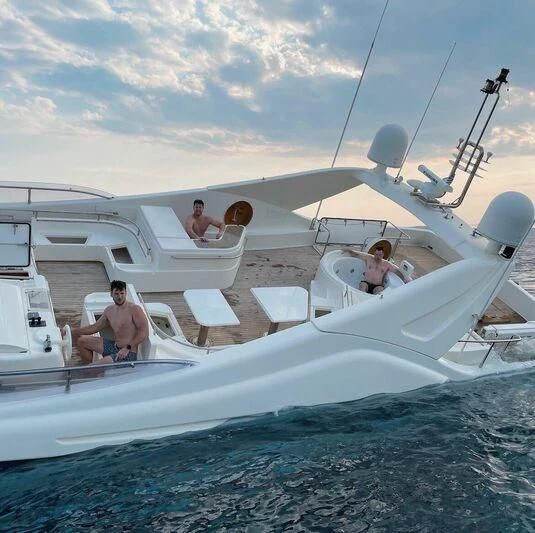 a group of people on a boat aboard GREEN WHISPER Yacht for Sale