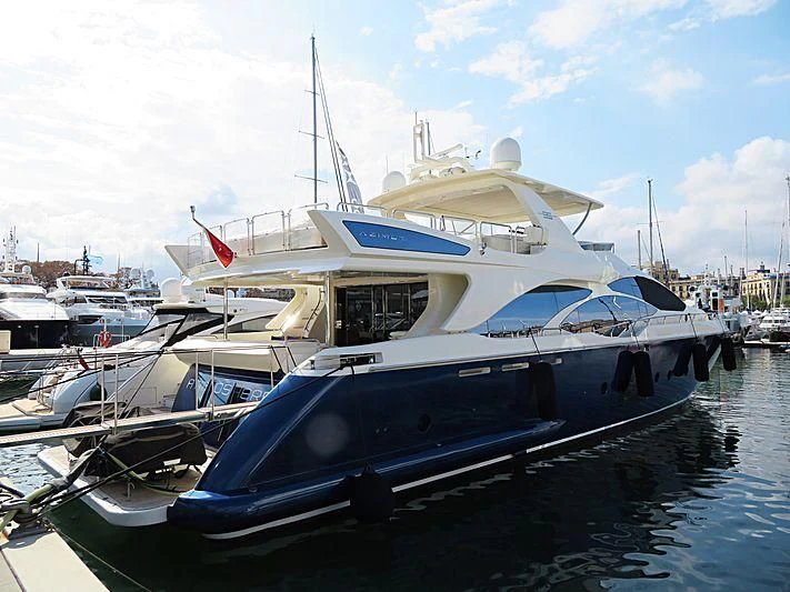 a boat docked at a pier aboard W1 Yacht for Sale