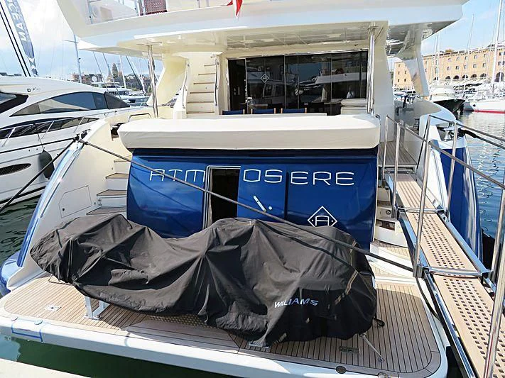 a boat with a tarp on it aboard W1 Yacht for Sale