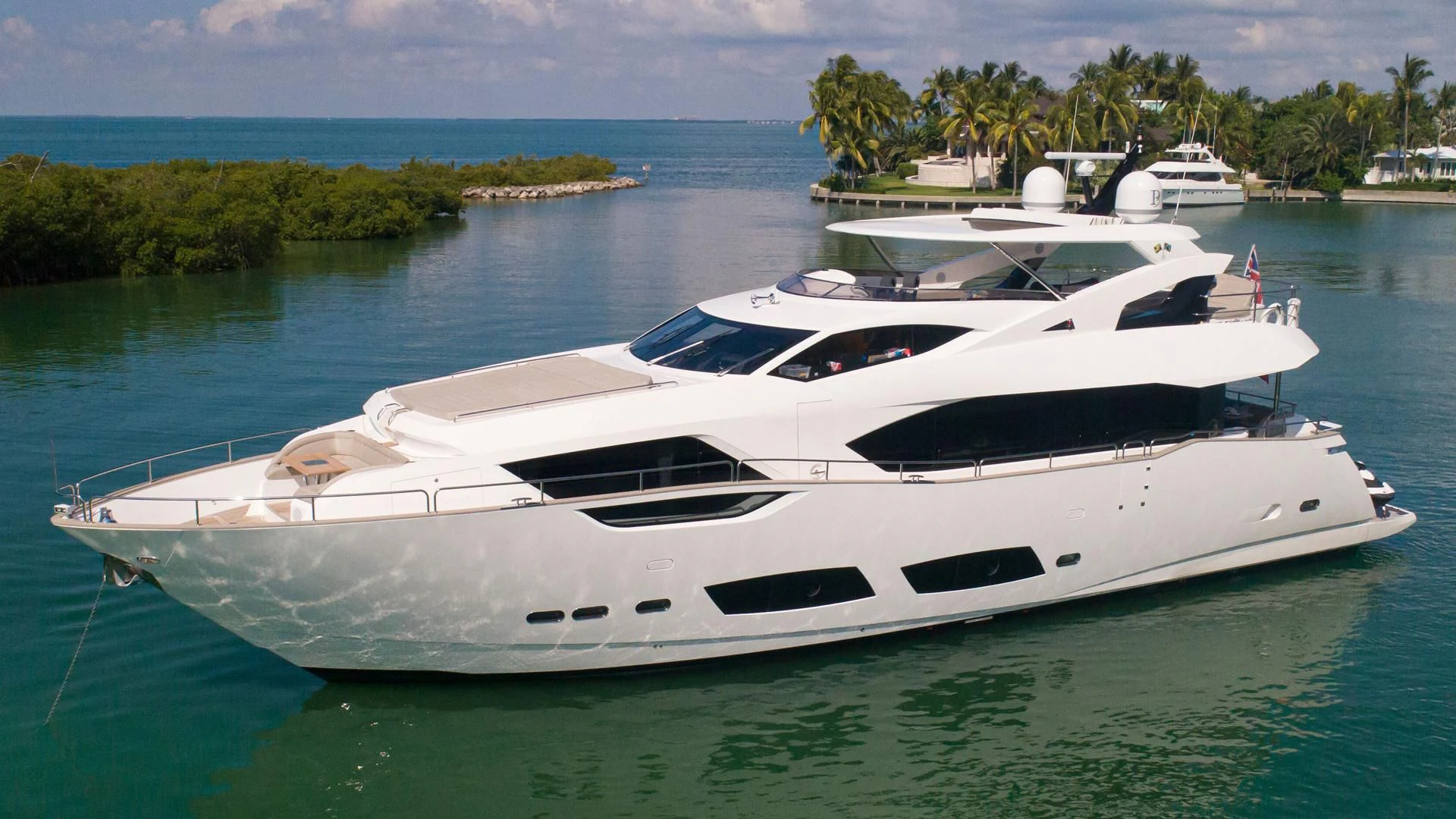 a white yacht in the water aboard JUST ONE MORE Yacht for Sale