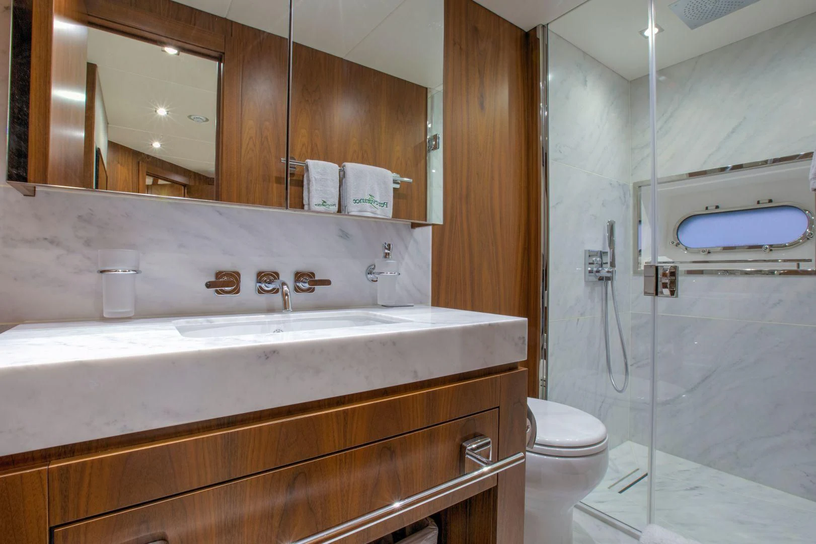 a bathroom with a sink and toilet aboard JUST ONE MORE Yacht for Sale