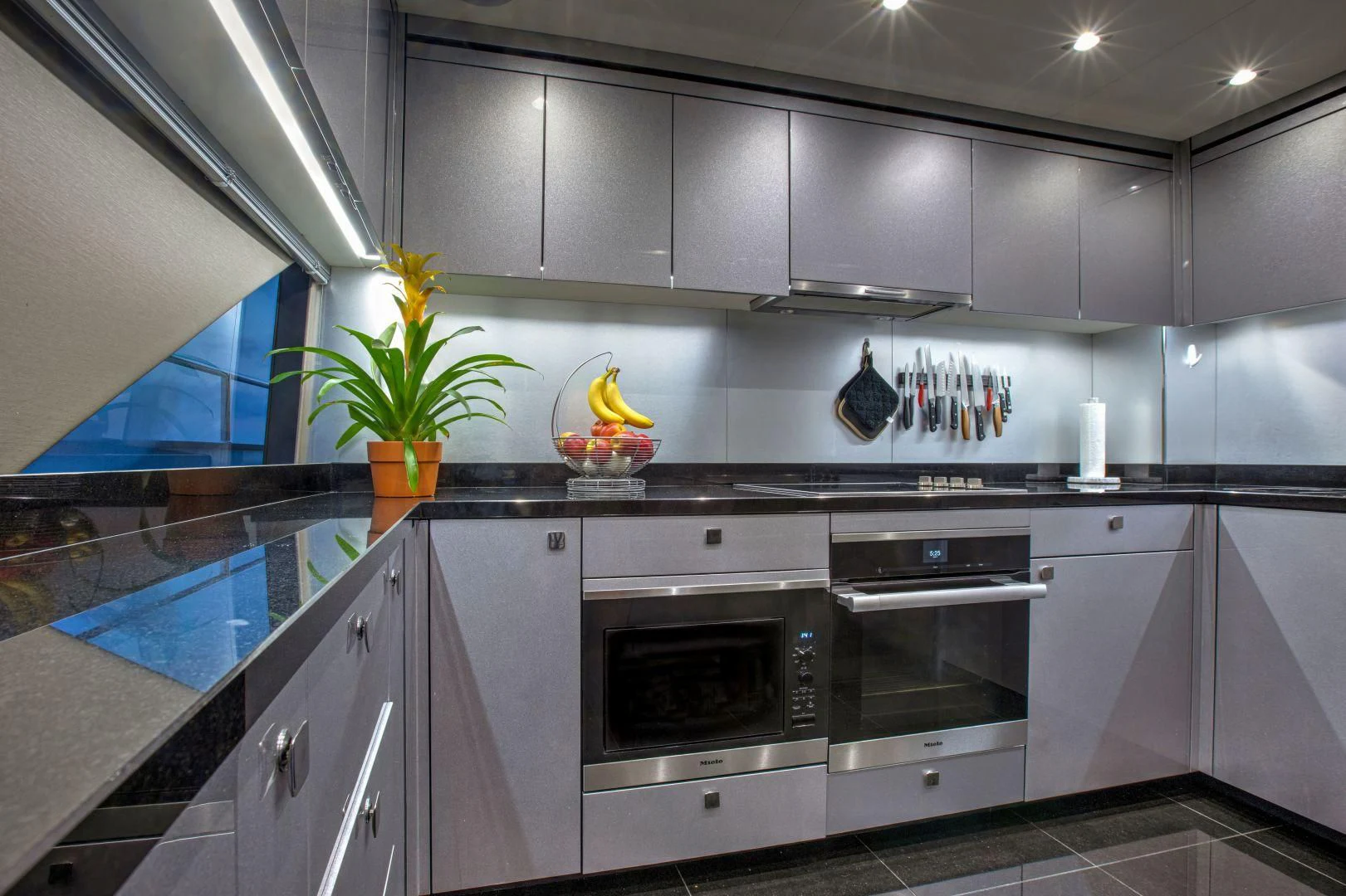 a kitchen with gray cabinets aboard JUST ONE MORE Yacht for Sale