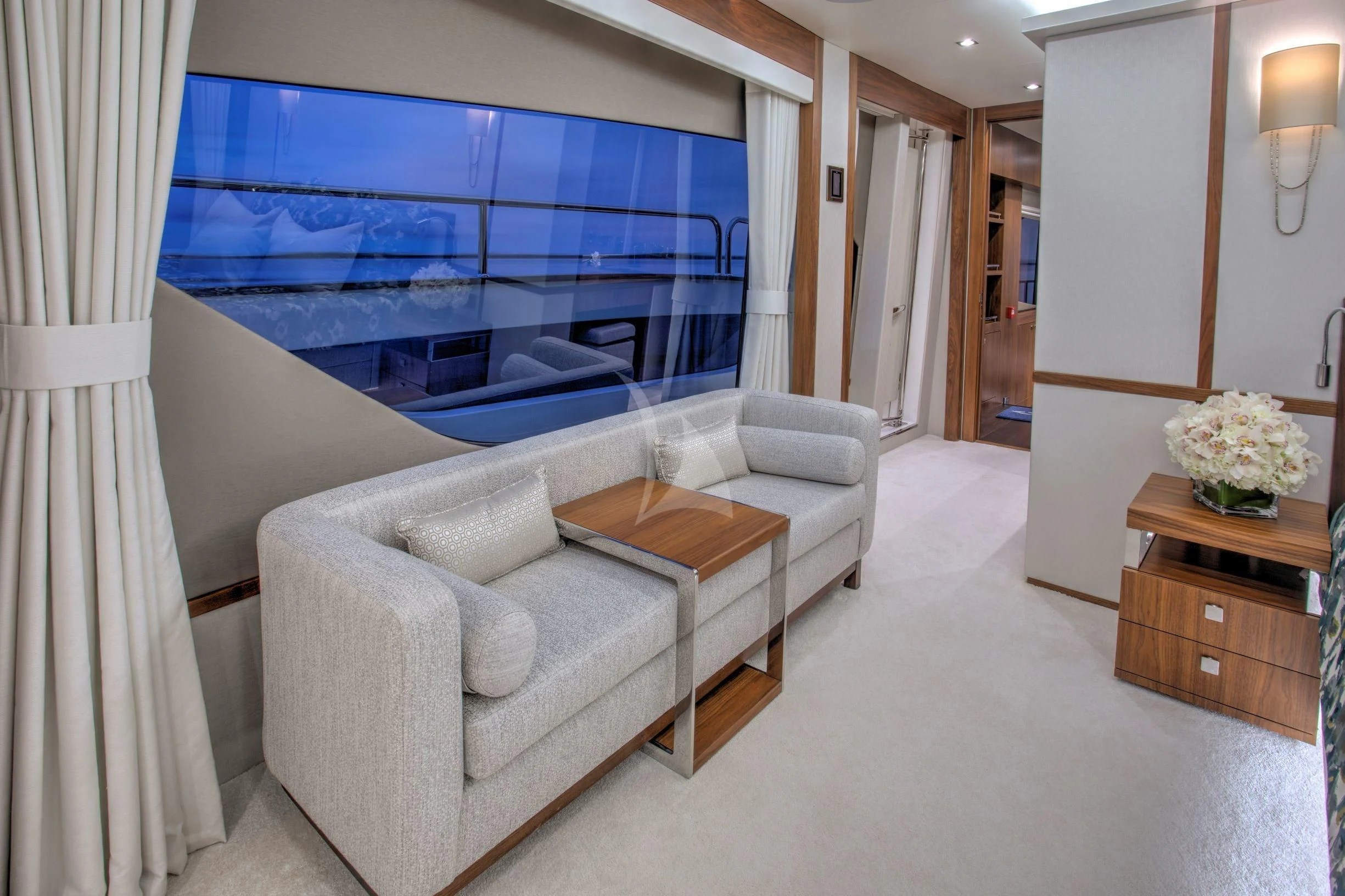 a living room with a couch and a table aboard JUST ONE MORE Yacht for Sale