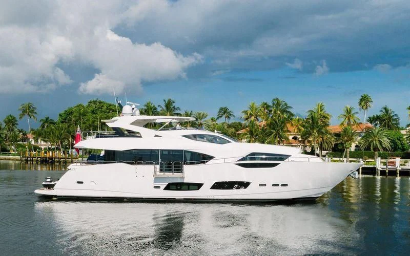 a white yacht on the water aboard JUST ONE MORE Yacht for Sale