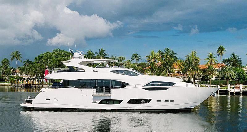 a white yacht on the water aboard JUST ONE MORE Yacht for Sale