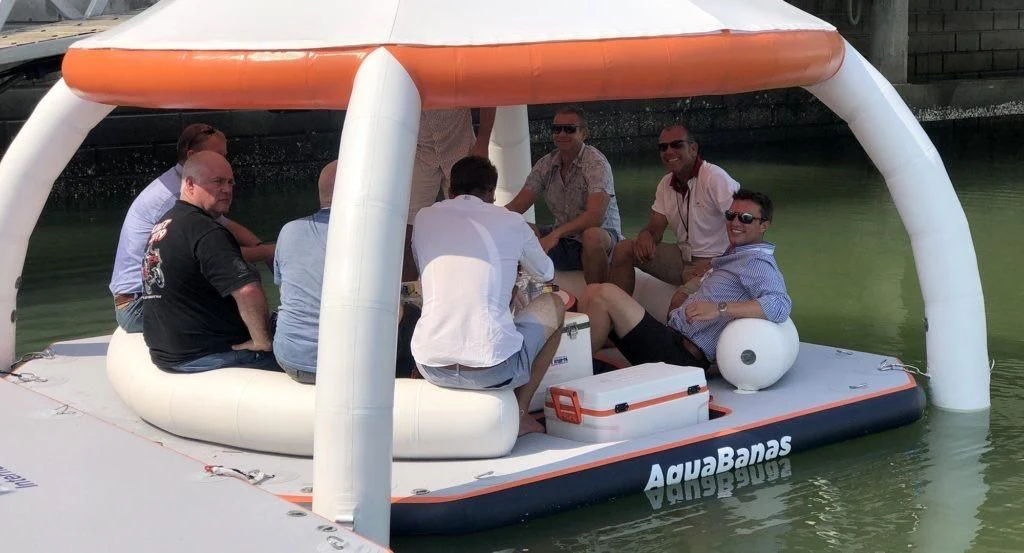 a group of people in a small boat aboard JUST ONE MORE Yacht for Sale