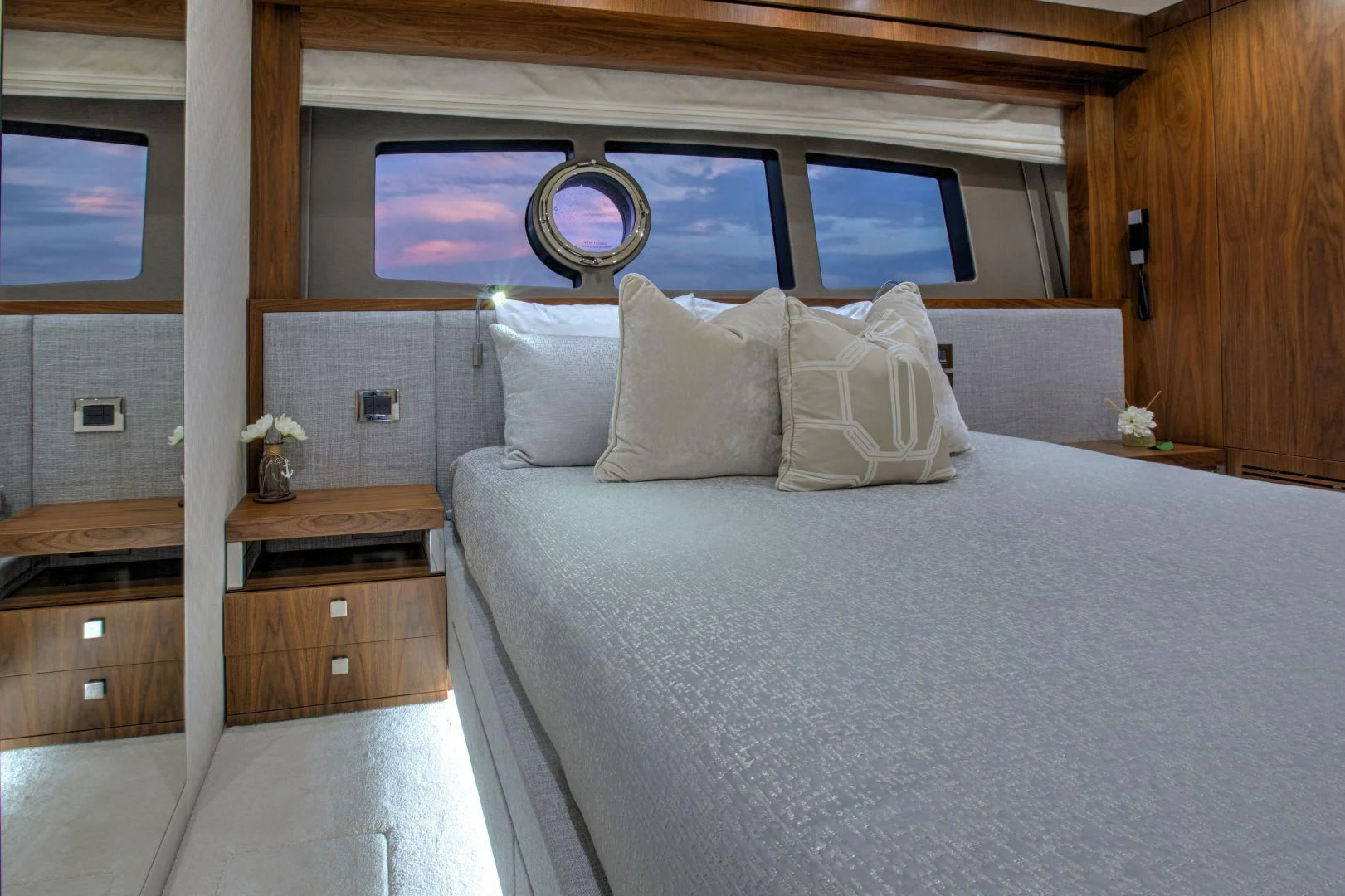 a bed with a white bed spread aboard JUST ONE MORE Yacht for Sale