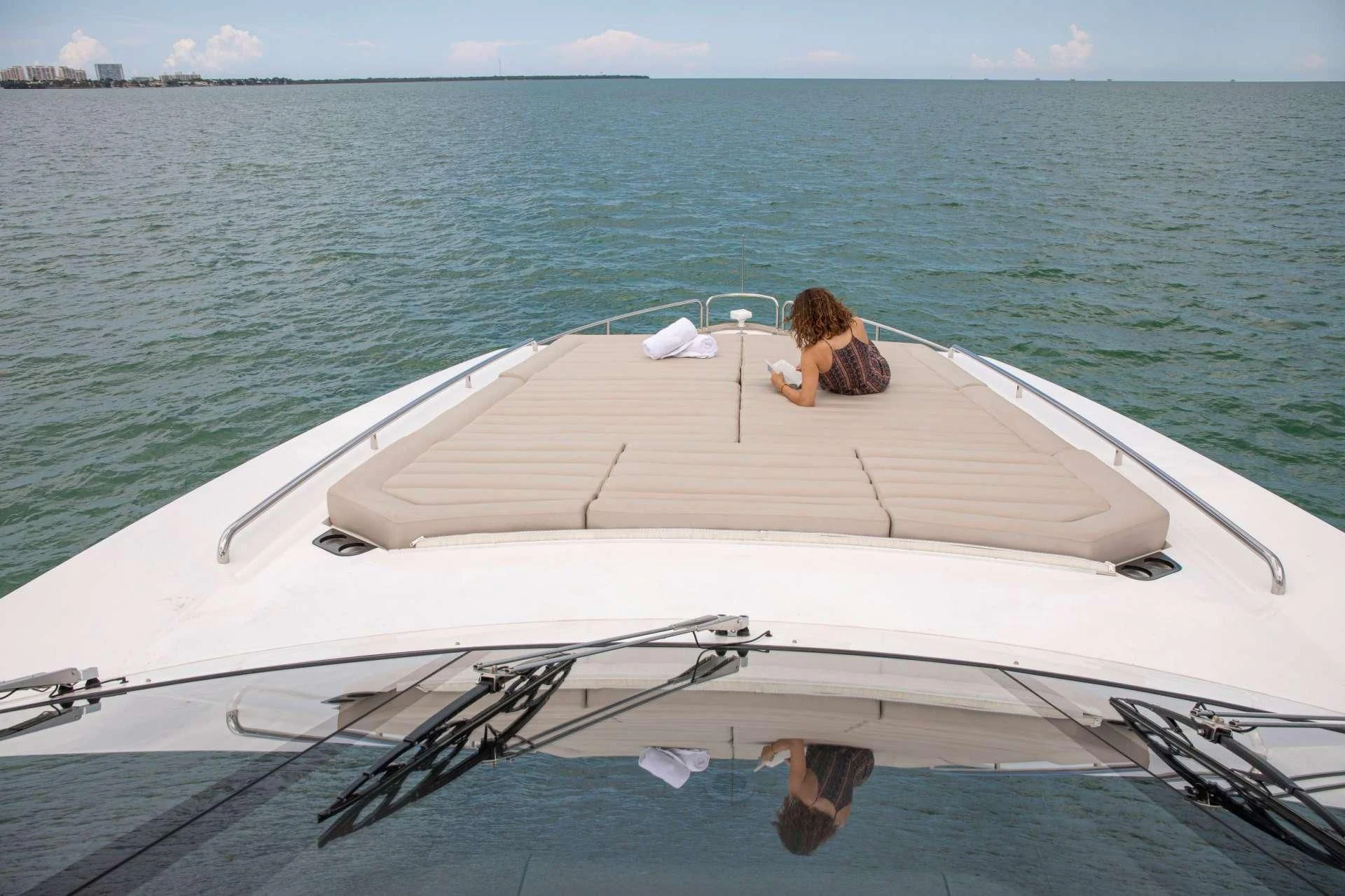 a person sitting on a boat aboard JUST ONE MORE Yacht for Sale