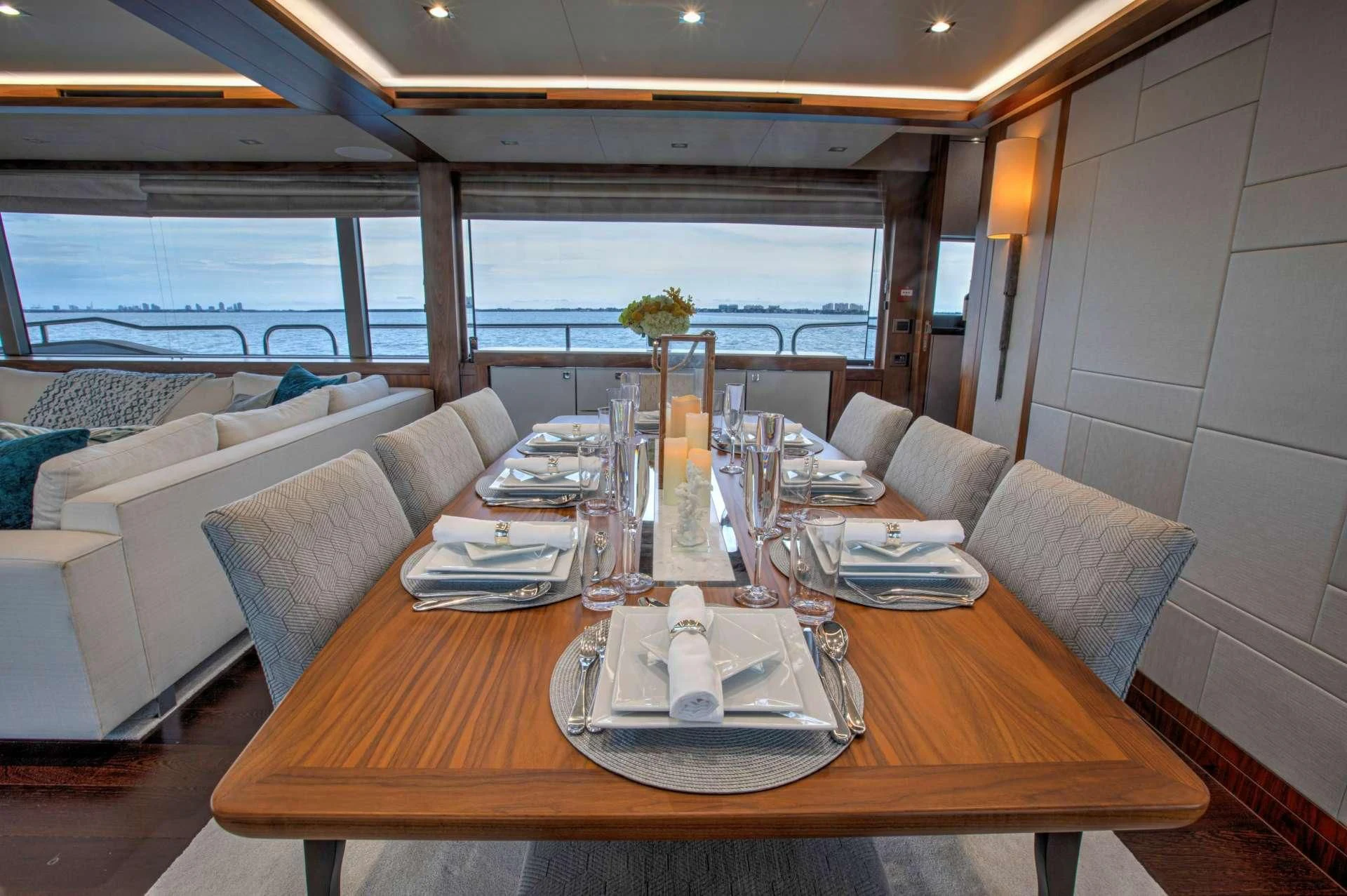 a table with plates and glasses on it aboard JUST ONE MORE Yacht for Sale