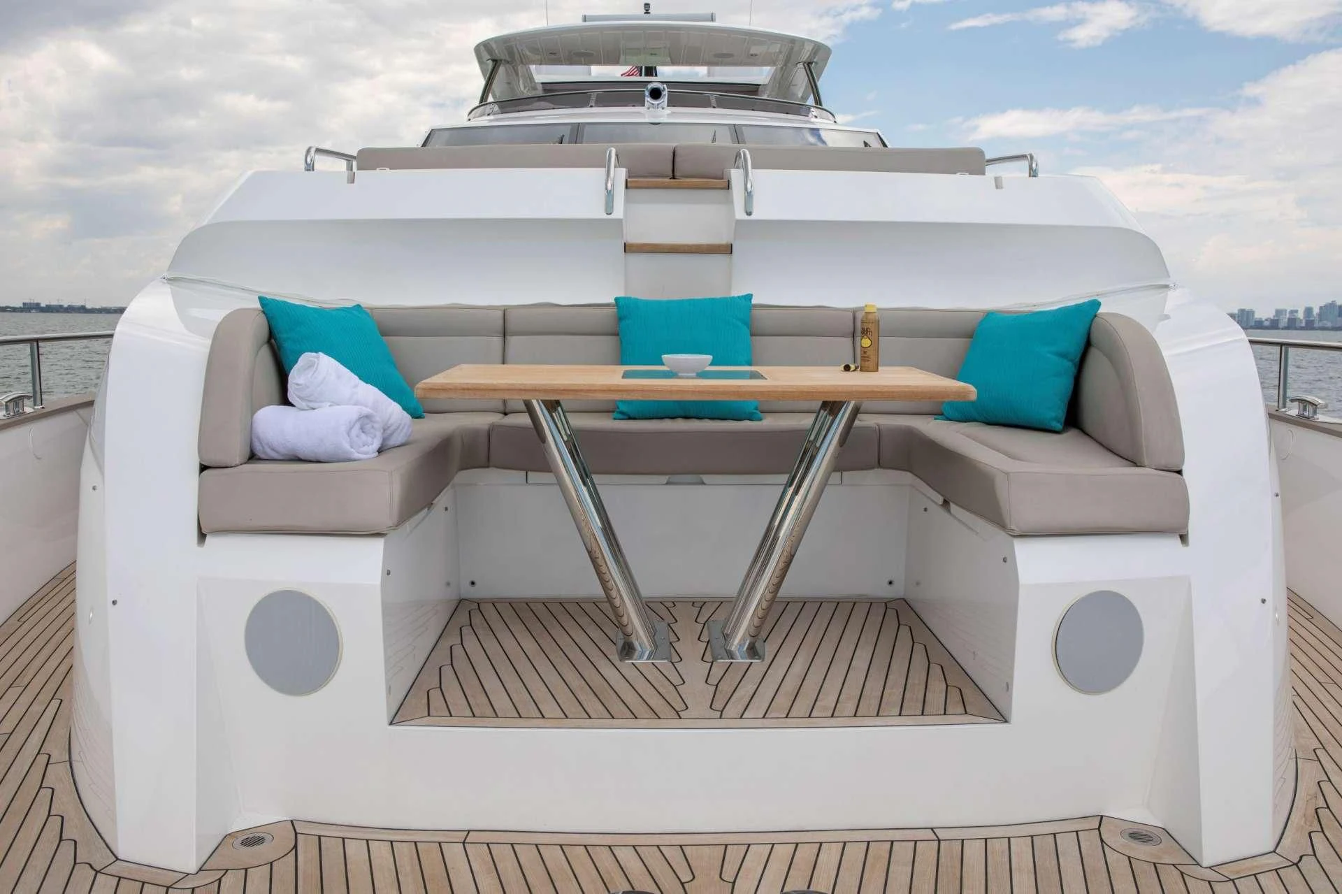 a white boat with blue pillows aboard JUST ONE MORE Yacht for Sale