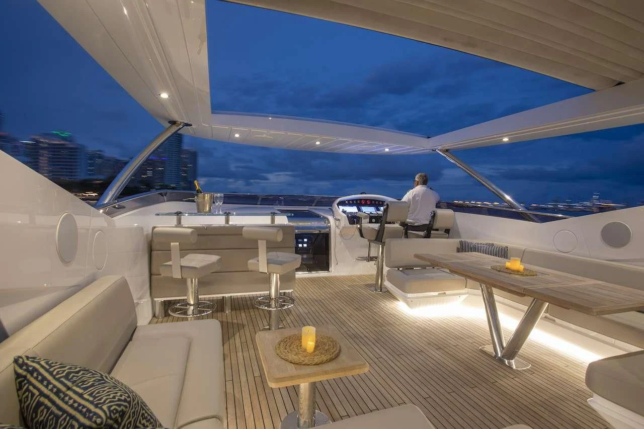 a person sitting on a boat aboard JUST ONE MORE Yacht for Sale
