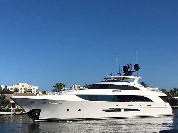 a white yacht in the water aboard SERENITY Yacht for Sale