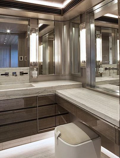 a bathroom with a large mirror aboard SERENITY Yacht for Sale