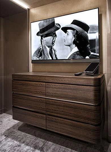 a dresser with a mirror on it aboard SERENITY Yacht for Sale