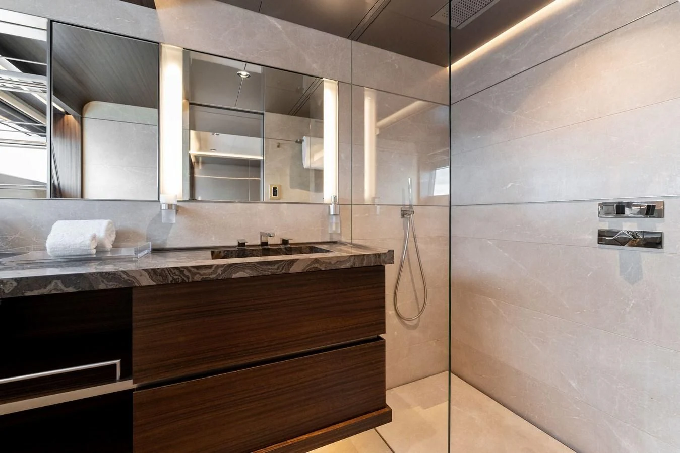 a kitchen with a sink and cabinets aboard SERENITY Yacht for Sale