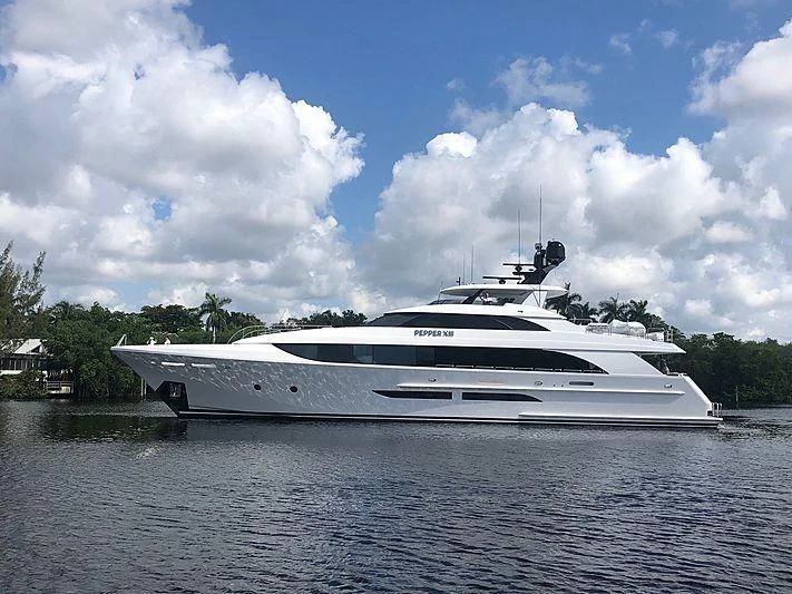a white yacht on the water aboard SERENITY Yacht for Sale