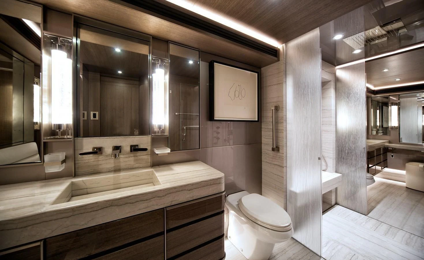a bathroom with a large mirror aboard SERENITY Yacht for Sale