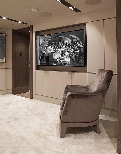 a chair in a room aboard SERENITY Yacht for Sale