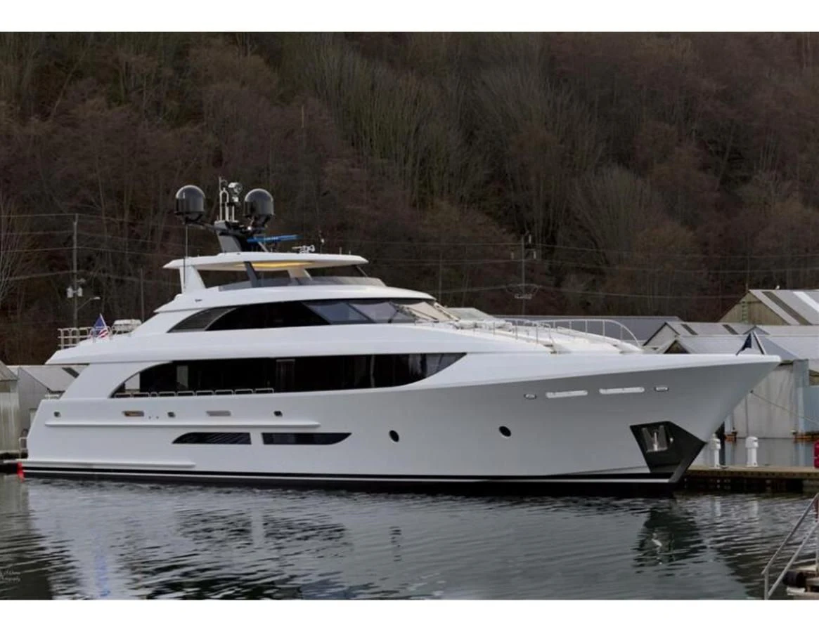 a white yacht in a lake aboard SERENITY Yacht for Sale