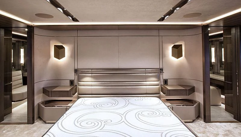 a large bathroom with a large bed aboard SERENITY Yacht for Sale