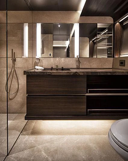 a bathroom with a sink and a toilet aboard SERENITY Yacht for Sale