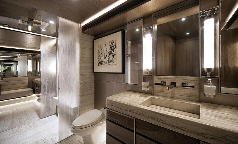 a bathroom with a large mirror aboard SERENITY Yacht for Sale