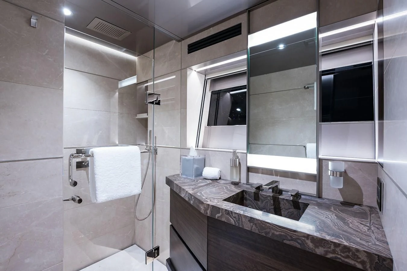 a bathroom with a sink and a shower aboard SERENITY Yacht for Sale
