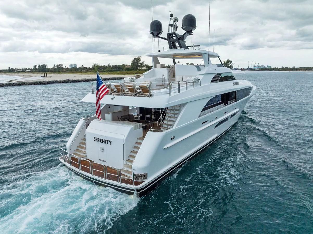 a large white boat in the water aboard SERENITY Yacht for Sale