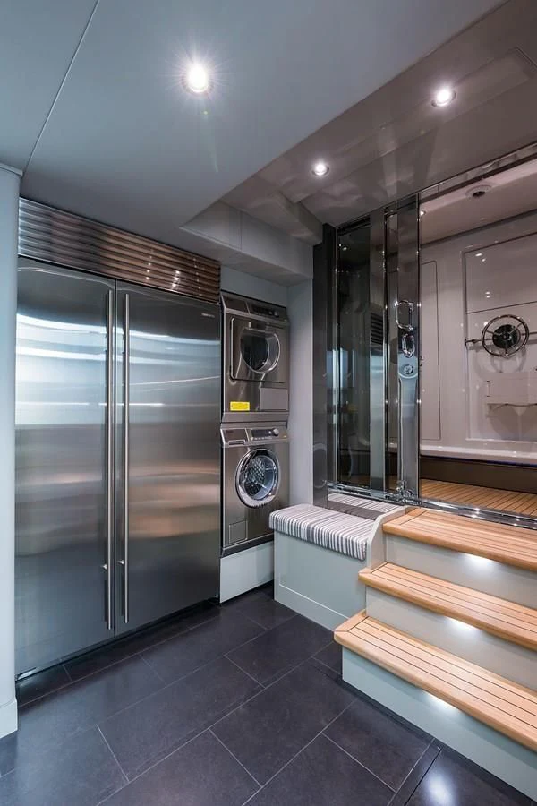 a modern bathroom with stainless steel appliances aboard SERENITY Yacht for Sale