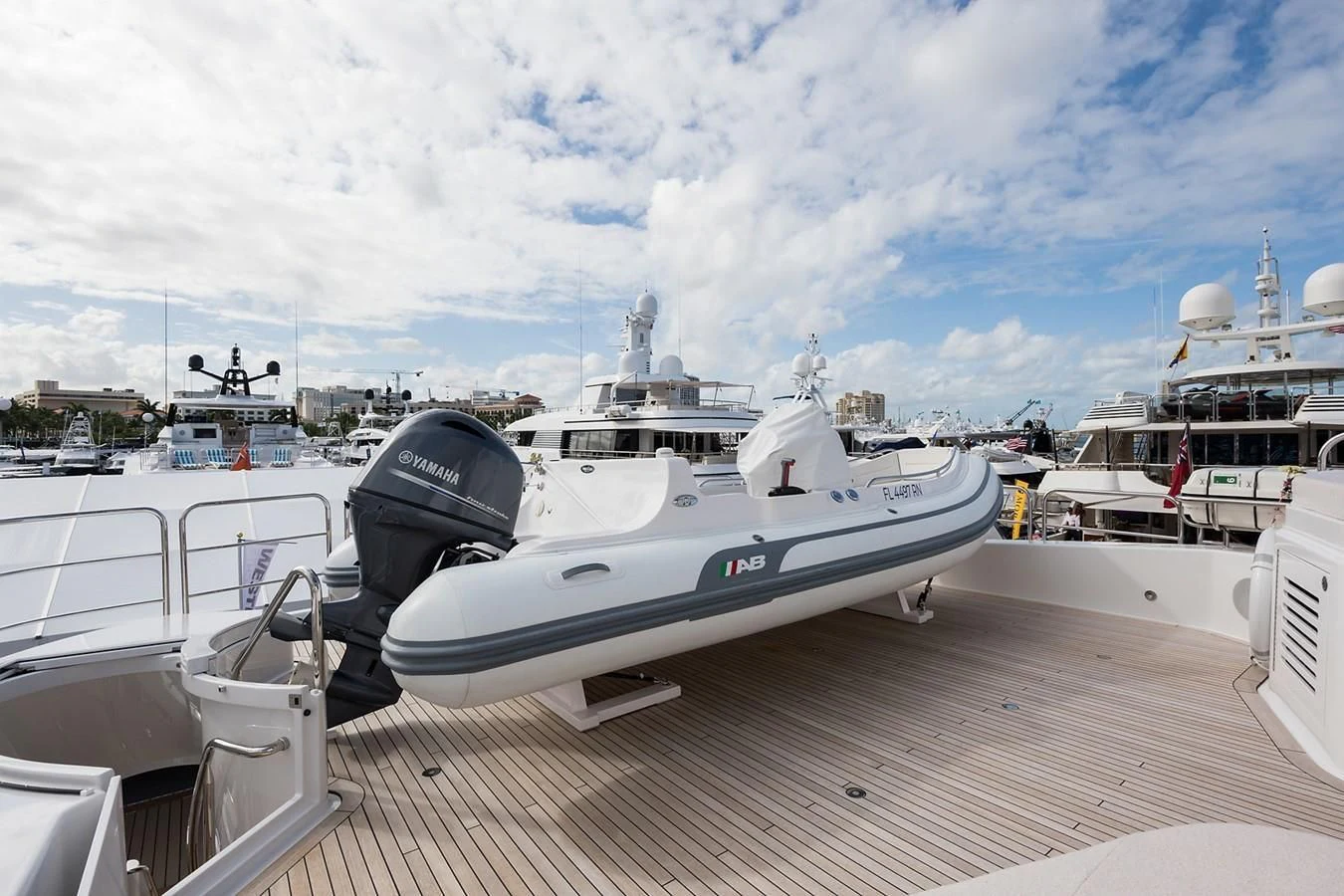a boat docked at a pier aboard SERENITY Yacht for Sale